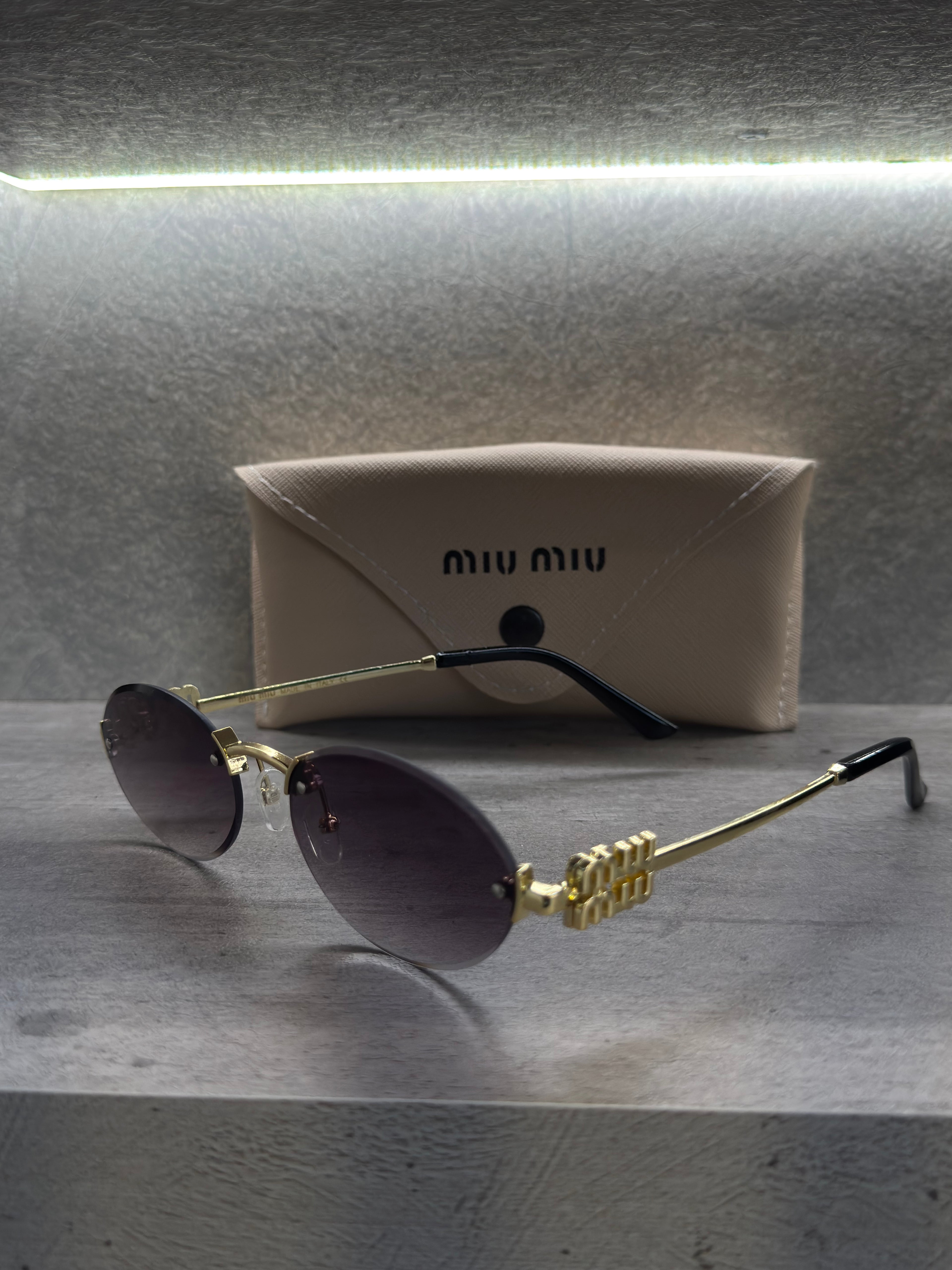 ΓΥΑΛΙΑ MIU-MIU - 1073